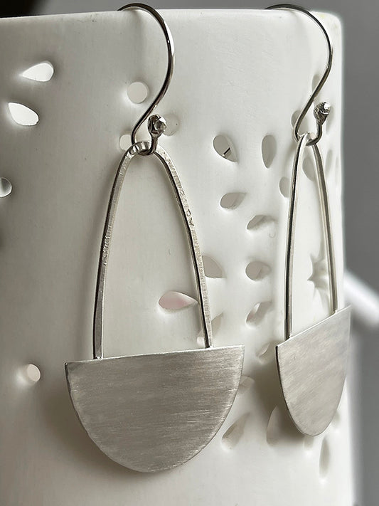 Handmade sterling silver earrings.